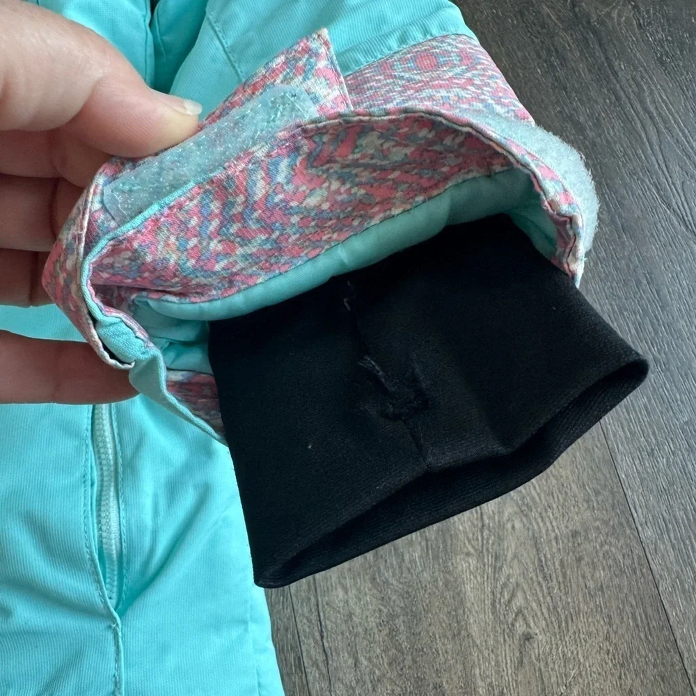 Arctix Winter Coat. Girls size large. Teal with pink details.